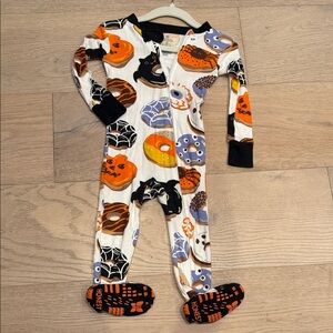 The Honest Company Halloween Kids Footie in Orange, Black, and White